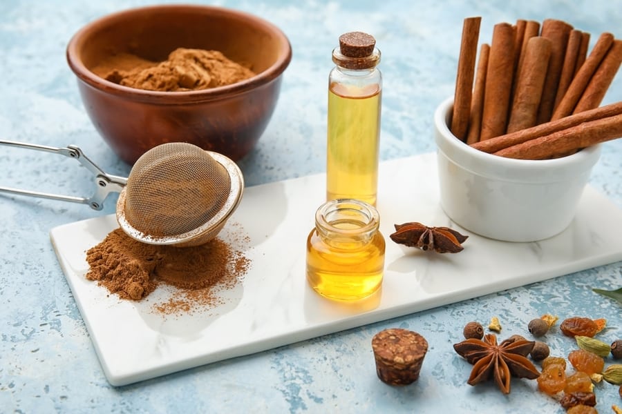 Cinnamon Powder And Cinnamon Essential Oil