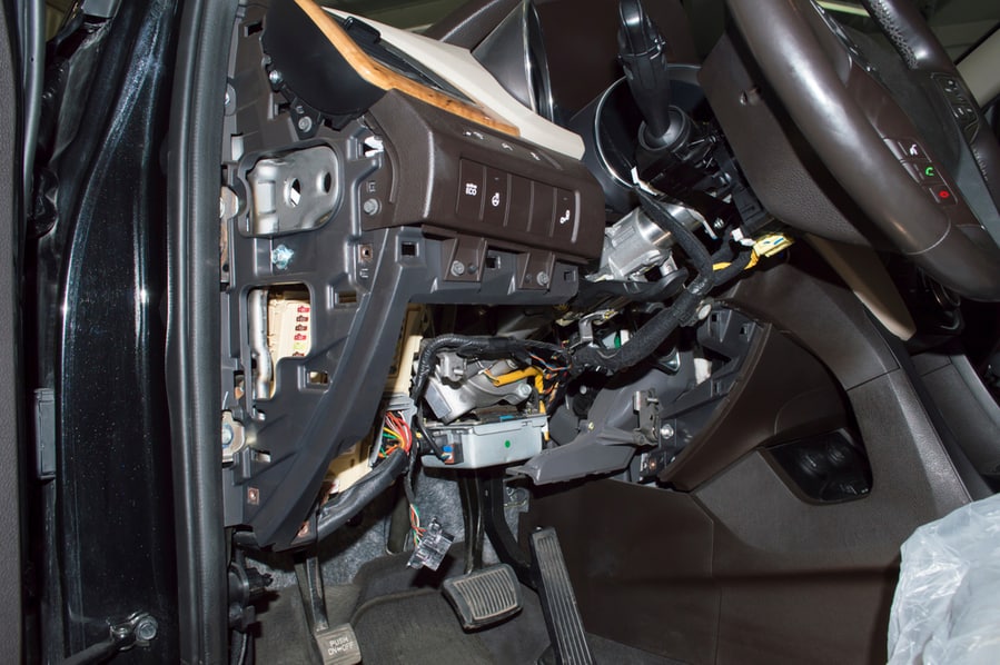Electrical Wiring And Fuse Box In The Car Interior Under The Dashboard