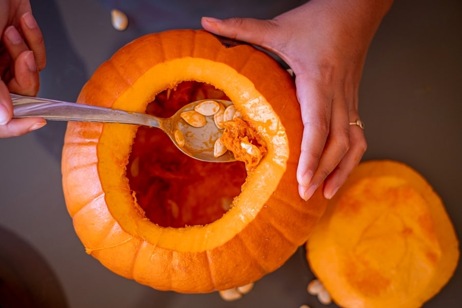 Emptying The Pumpkin Pulp For Halloween