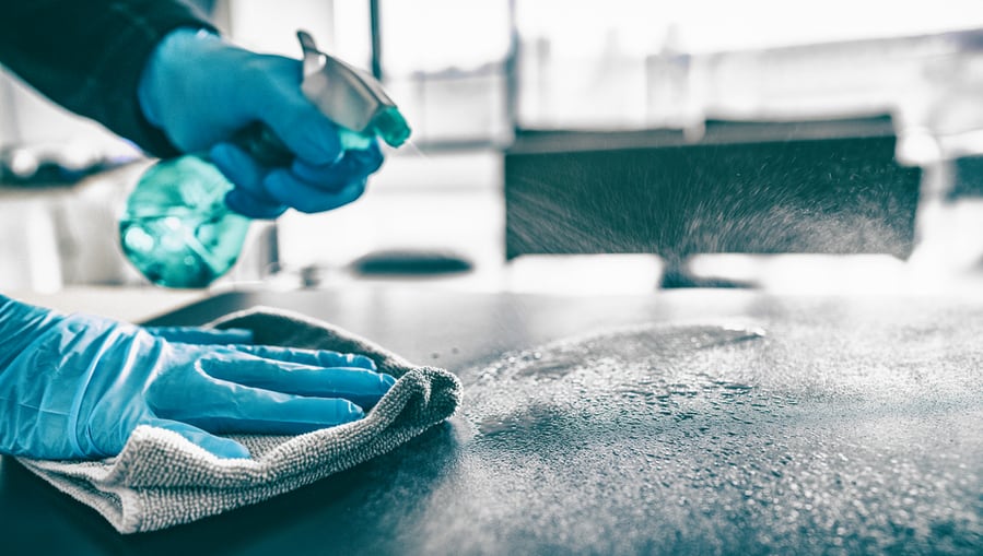 Man Cleaning The Surface