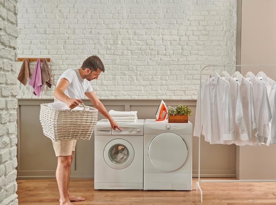 Man Using Washing Machine