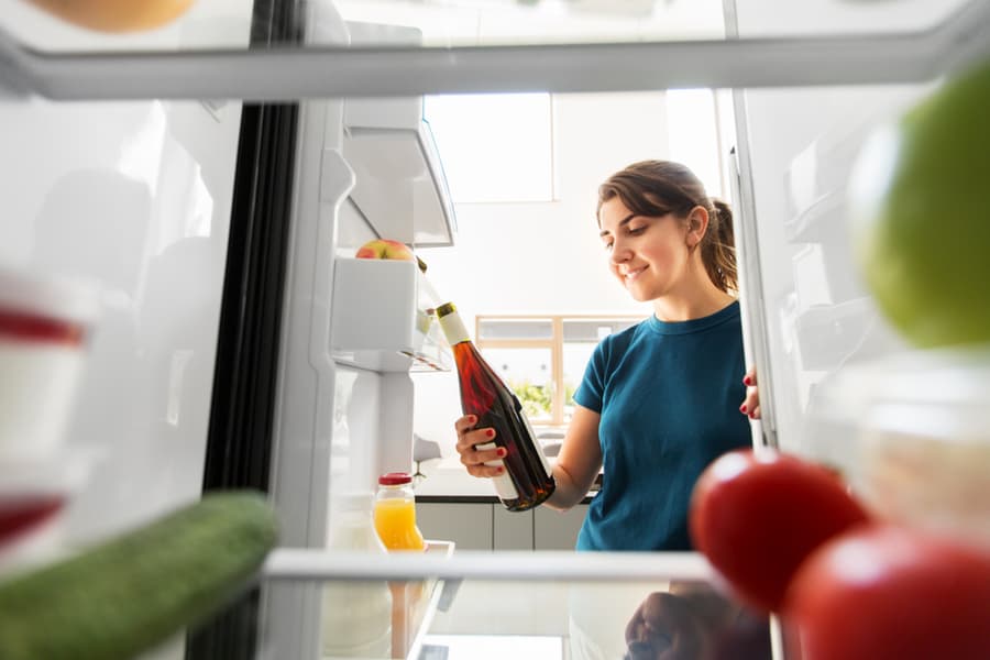 Orange Wine Bottle From Fridge