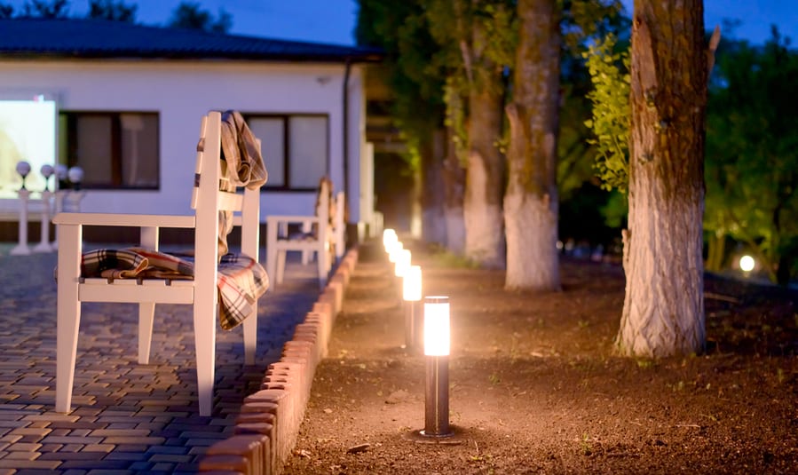 Row Of Illuminated Outdoor Lights In Ground
