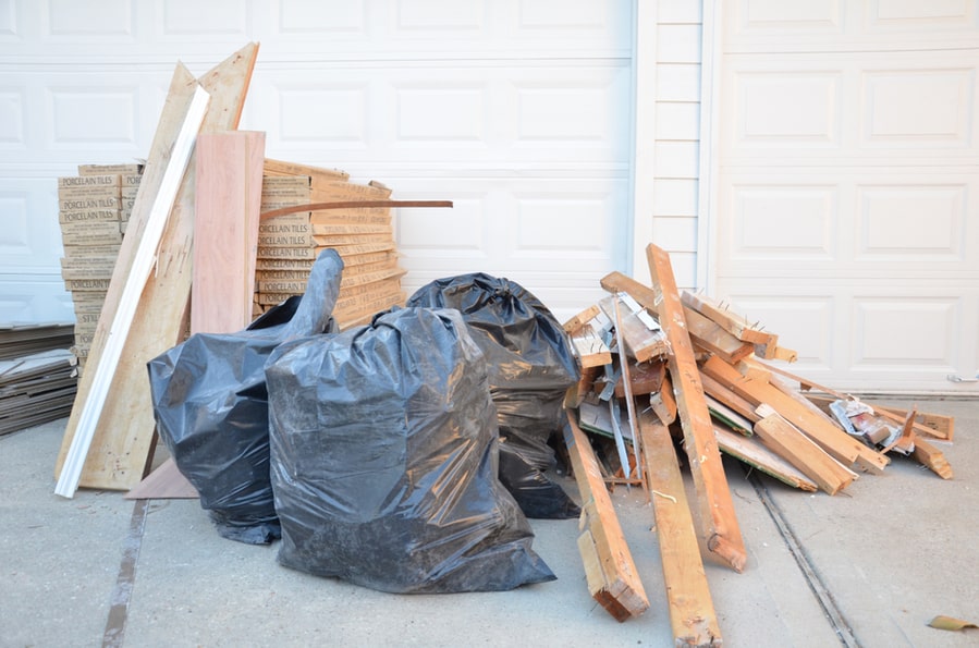 Trash And Wood In The Garage