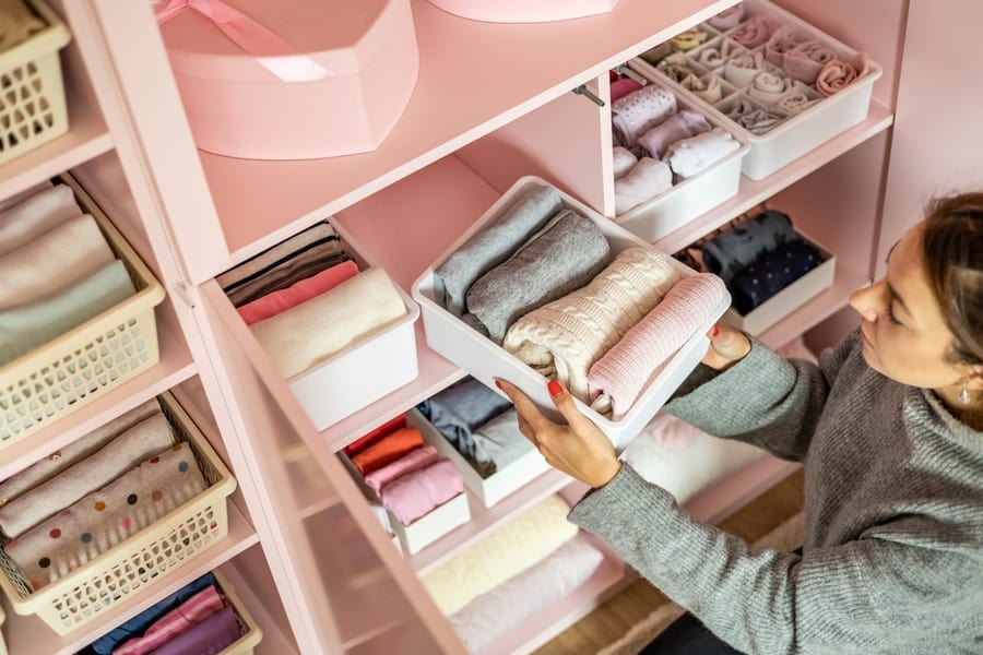 Woman Checking Her Closet Infested By Ants