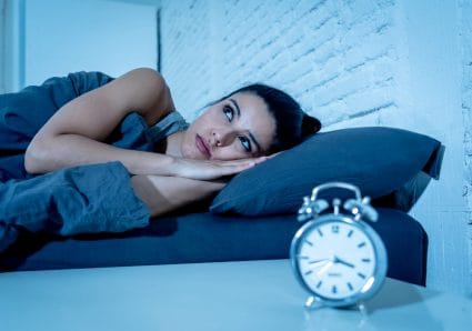 Woman Hearing Scratching In Her Wall