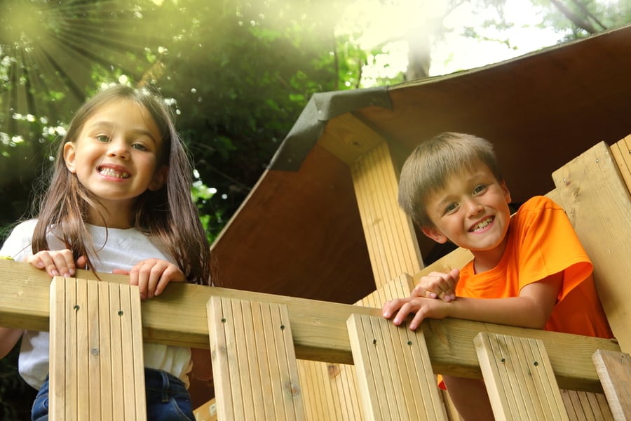 Boy And Girl In A Playhouse