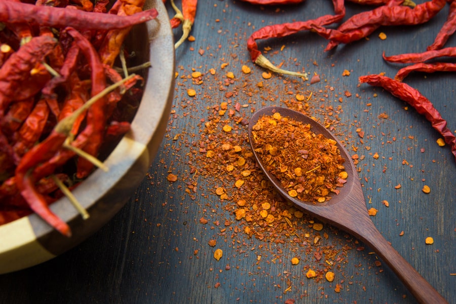 Cayenne Pepper On Wooden Floor