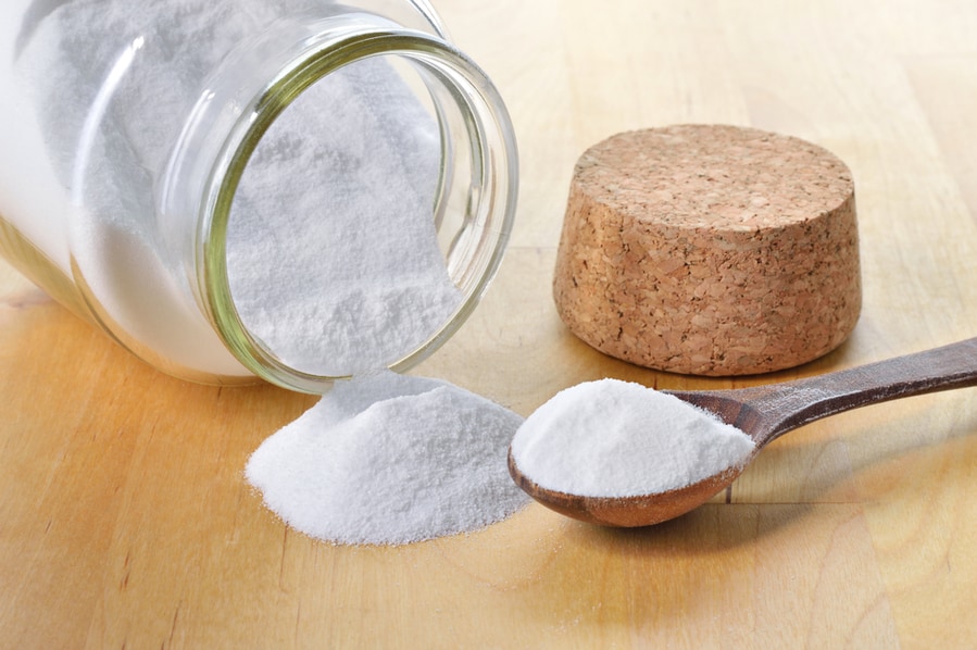 Close-Up Of Baking Soda In A Glass Jar