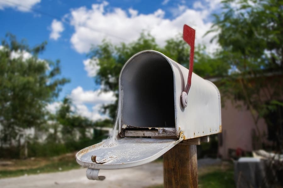 Open Mailbox In The Yard Of A House Cobweb Inside Mailbox