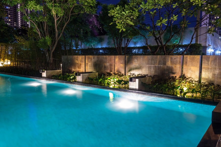 Pool Lighting In Backyard At Night For Family Lifestyle And Living Area