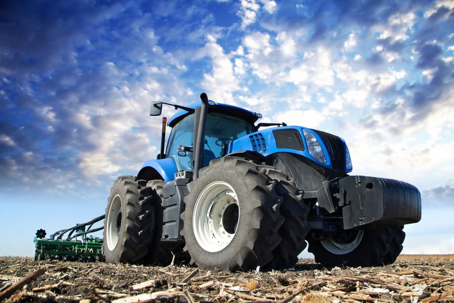 The Tractor Wheels On The Huge Field