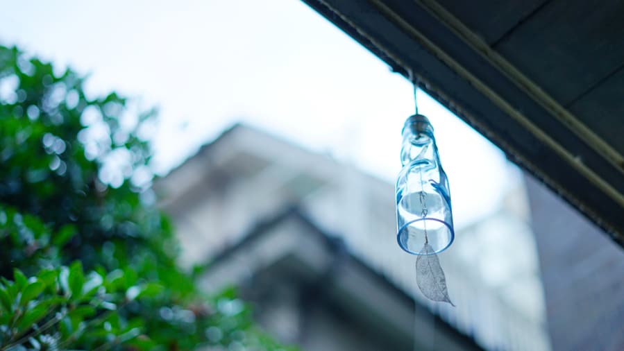 Wind Bell Made From Glass Bottle Of Cider