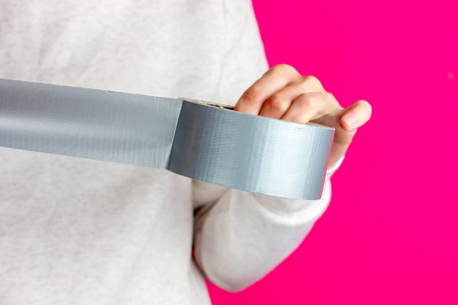 Woman Using A Duct Tape