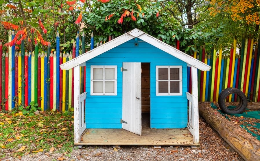 A Small And Light Colored Playhouse For Children