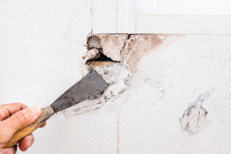 Detail Of The Repair Of A Hole In The Wall Of The Living Room Using Filling Mass.