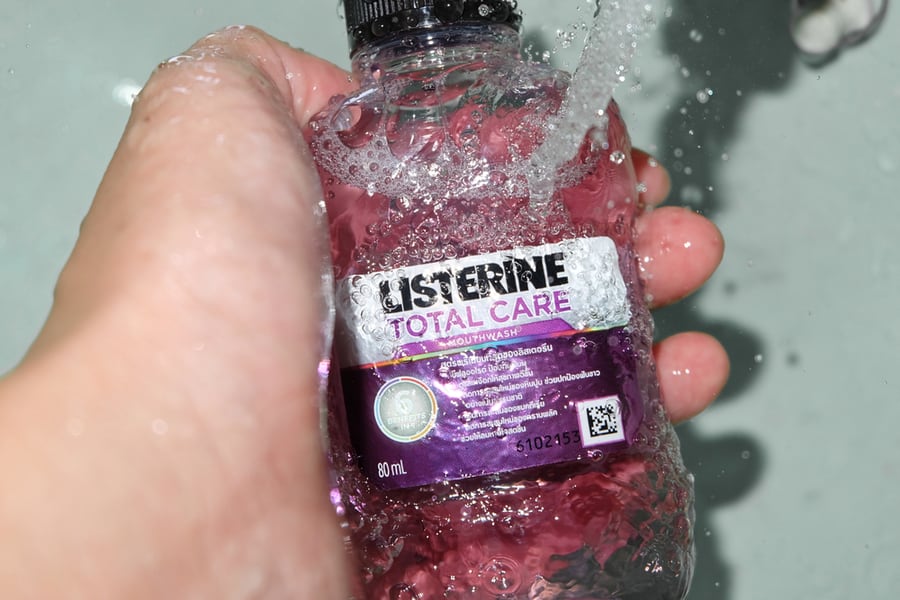 Listerine Mouthwash And Water From The Sink