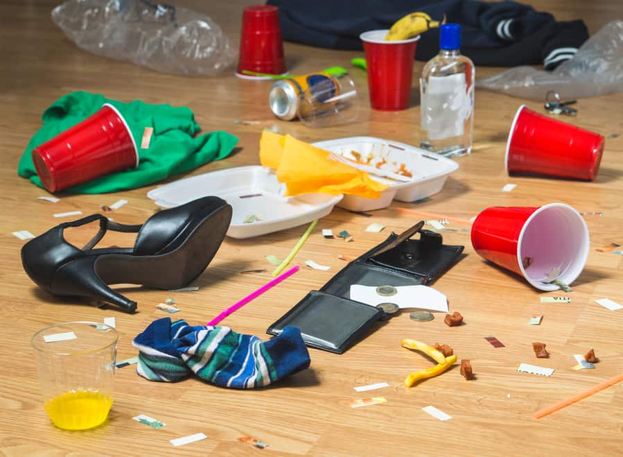 Trash, Bottles, Food, Cups On The Floor