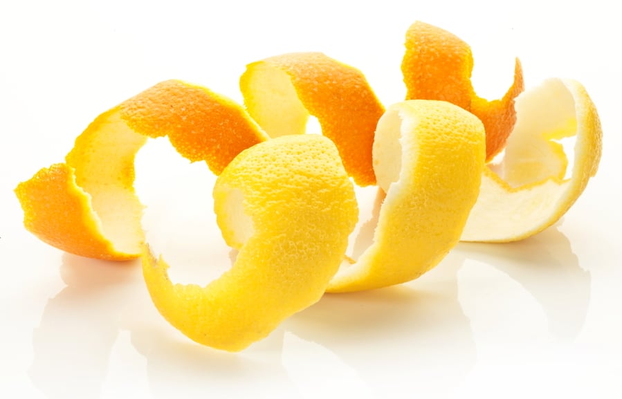 Twist Of Citrus Peel On A White Background.